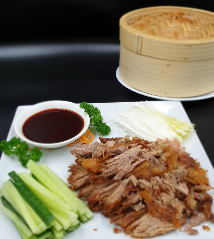chinese crispy shredded duck with pancakes available at pawpaw chinese restaurants and takeaways